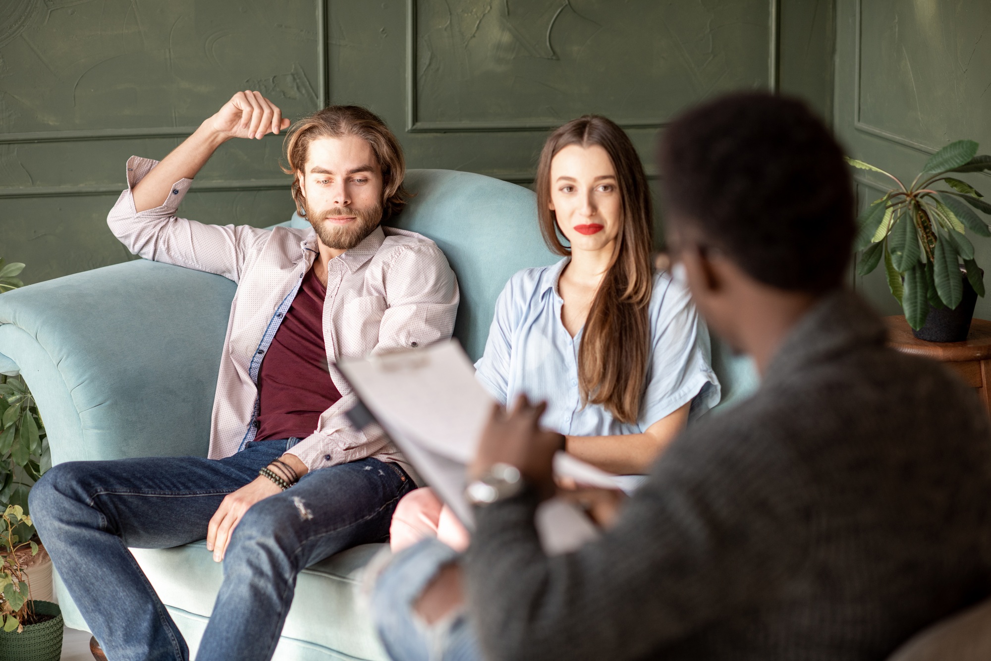 Young couple during a psychological session with psychologist